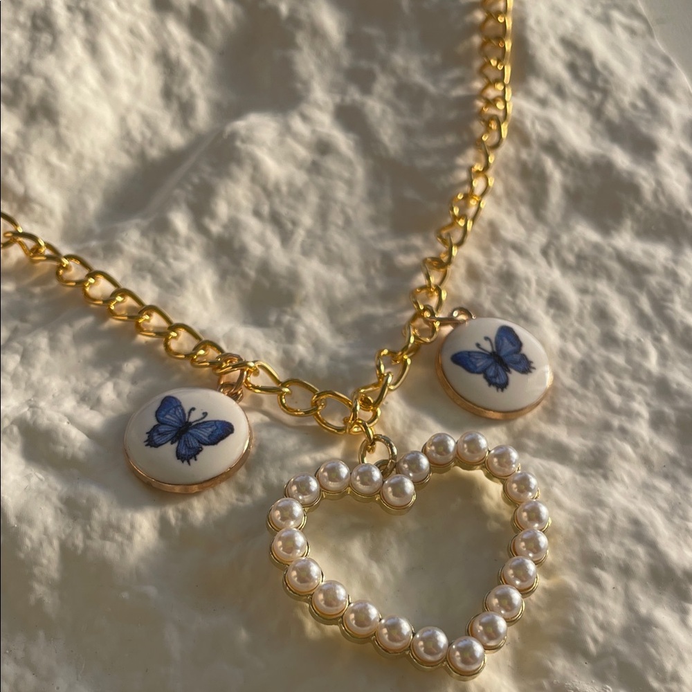 Gold Necklace with Pearl Heart and Blue Butterfly Charms